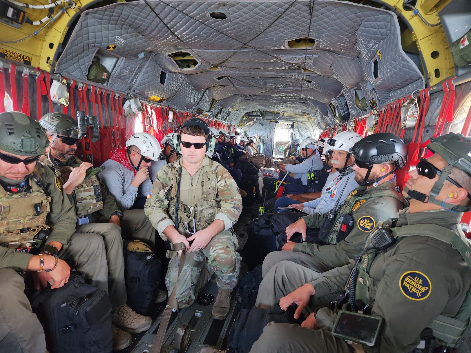 Members of the Mississippi Army National Guard's 185th Expeditionary Combat Aviation Brigade transport search and rescue team members to the hardest hit areas in Tampa following Hurricane Helene, Sept. 27, 2024.